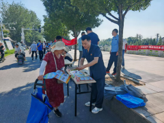 吊挂、设置法令征询台、发放宣传材料、现场答